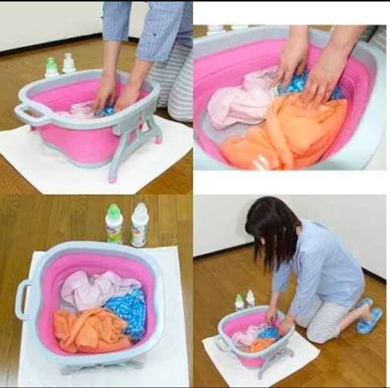 洗濯物を入れて使うピンクの足湯バケツ